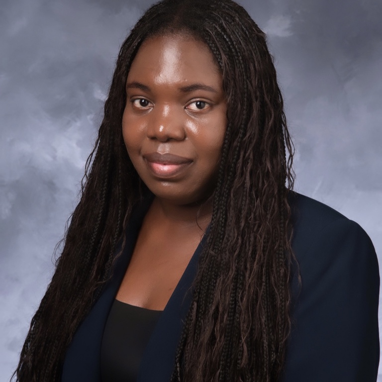 headshot of Ritah Mudhungu