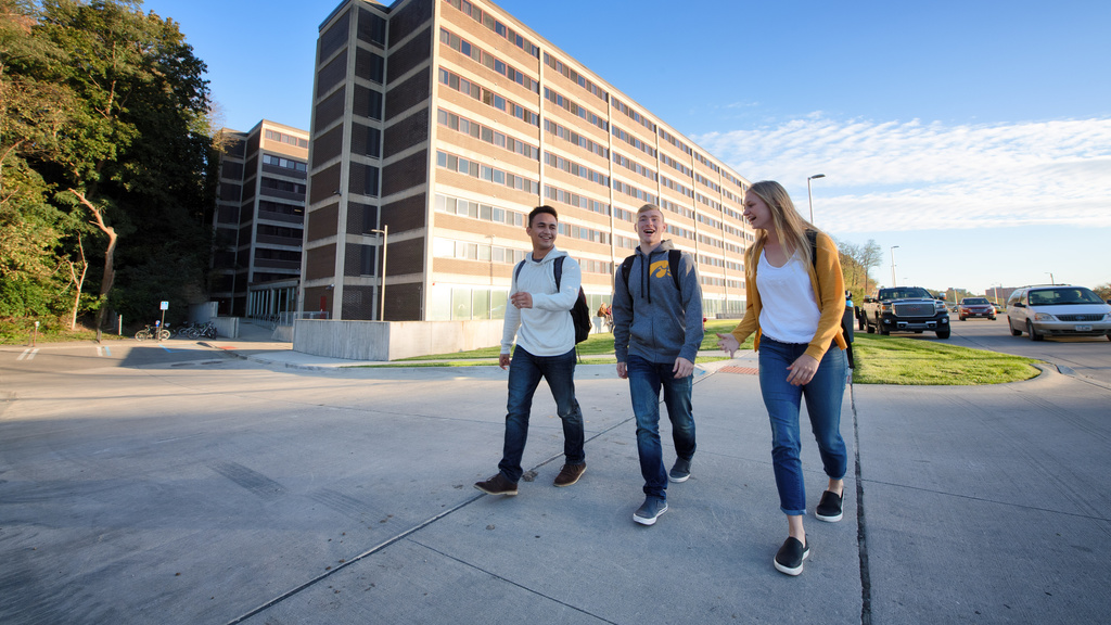 Students walking on a sidewalk