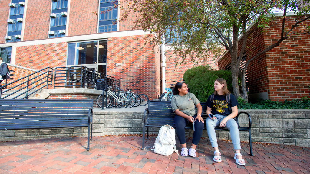 Students sitting and talking with one another
